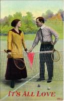 1911 Its All Love. Romantic couple playing tennis, tennis rackets