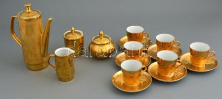 Aranyszínű német porcelán mokkás készlet, jelzett (Koszorúsné), kopásnyomokkal, lepattanással.
