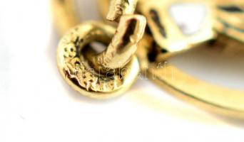 Arany (Au) 14K oroszlános és kéményseprős medálok, 2 db, jelzettek, 2x1,5 cm, 2x1 cm, nettó: 1,45 g