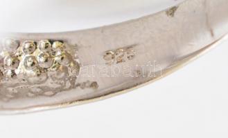 Ezüst(Ag) szögletes gyűrű, apró kövekkel, jelzett, méret: 52, bruttó: 4,65 g