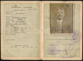 1923 Magyar Királyság fényképes útlevél, Nagymuzsajon, Kárpátalján szül. budapesti lakos részére, néhány román bejegyzéssel és pecséttel, kopott papírkötésben. Hozzá tartozik: az útlevél tulajdonosának névjegye.