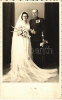 1943 Magyar katonatiszt esküvői fotója a feleségével, kitüntetések és kard. Patakiné, Rákospalota / Wedding photo of a Hungarian military officer