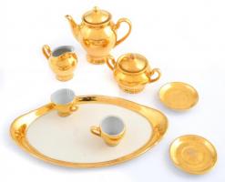 Porcelán mini teáskészlet, aranyozott, jelzetlen, kopásokkal, 2 db csésze + aljakkal, m: 3 cm, d: 5 cm, 1 db kanna fedővel, m: 8,5 cm, 1 db cukortartó fedővel, m: 5,5 cm, 1 db kiöntő, m: 5 cm, 1 db tálca 10x17,5 cm