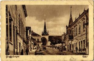 1941 Bánffyhunyad, Huedin; Fő tér, üzletek, templom. Ábrahám kiadása / main square, shops, church (EB)
