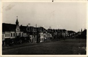 1943 Szászrégen, Reghin; Fő utca, Városháza, üzletek / main street, town hall, shops