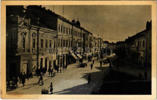 1939 Munkács, Mukacheve, Mukacevo; Rákóczi utca, üzletek, automobil / street view, shops, automobile (fl)