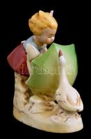Porcelán libás kislány figura, kézzel festett, jelzés nélkül, lepattanásokkal, két gyári lyukkal az oldalán, 12x11 cm