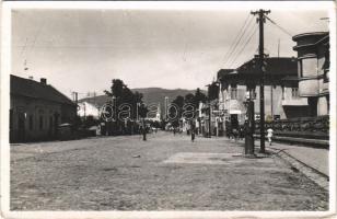 1944 Szolyva, Svalava, Svaljava, Szvaljava, Svaliava; utca, benzinkút, Bata cipő bolt, gyógyszertár / street, gas station, shops, pharmacy. Mikei foto, photo  (EK)