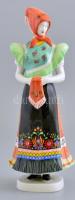 Hollóházi porcelán népviseletes női figura, kézzel festett, jelzett, az alján lepattanásokkal, m: 28,5 cm