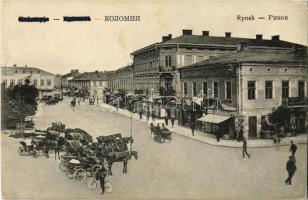 1915 Kolomyia, Kolomyja, Kolomyya, Kolomea; Rynek / street view, bicycle, horse-drawn carriages, market vendors, shop of Moses Deutsch