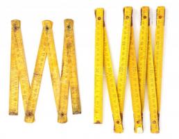 2 db sárga colstok, egyiken román felirattal