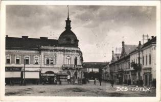 Dés, Dej; Fő tér, Bíró textil, V. Roman üzlete, Minerva gyógyszertár / main square, shops, pharmacy. photo + "1940 Dés visszatért" So. Stpl