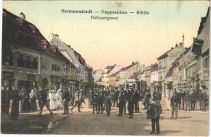 1915 Nagyszeben, Hermannstadt, Sibiu; Heltauergasse / Disznódi utca, villamos, Grell üzlete, K.u.K. katonák. F. Stoiber kiadása / street view, tram, shops, K.u.K. soldiers (EB)