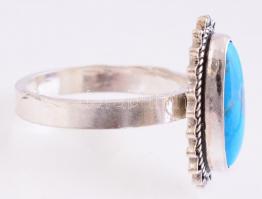 Ezüst(Ag) gyűrű, türkizszínű kék kővel, jelzés nélkül, méret: 55, bruttó: 4,41 g