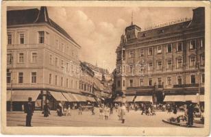 1921 Zagreb, Zágráb; Duga ulica / street view, insurance company, shops, traffic police officer (EK)