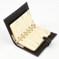 minőségi bőr Filofax 2000-es naptár, címjegyzék és jegyzetfüzet, spirálos kötésben, karton dobozában