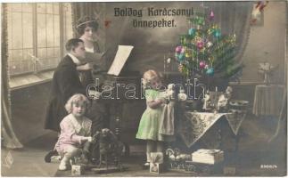 Boldog Karácsonyi ünnepeket / Christmas greeting card, family on Christmas Eve (fl)