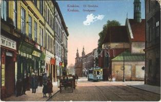 Kraków, Krakau; Ul. Grodzka / Gradgasse / street view, church, tram, shops (EK)
