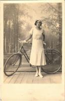 Lady with bicycle. photo (fl)