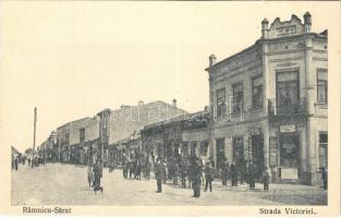 Ramnicu-Sarat, Rimnicu-Sarat; Strada Victoriei / street view, shops (cut)