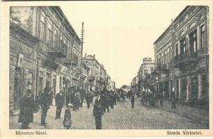 Ramnicu-Sarat, Rimnicu-Sarat; Strada Victoriei / street view, shops (cut)