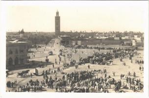 Marrakesh, Marrakech; Place Djemaa / square, makrket vendors, automobile, bicycle, pharmacy