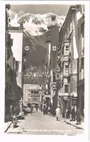 ~1950 Innsbruck, Herzog Friedrich Strasse mit Goldenem Dachl, Garage Hotel Gold Rose, Cafe Konditorei Mundling, Weisses Kreuz Garage / street, swastika flags, shops