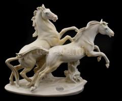 Ens porcelán vágtató lovak nagy méretű szobor. Fehér mázas, jelzett, matricával is. Egy apró lepattanással / ENS double horses porcelain figurine with a minor fault. 31x24 cm
