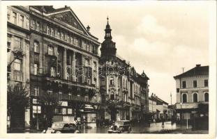 1943 Kolozsvár, Cluj; Mátyás kir. tér, New York szálloda, üzletek, automobilok / square, hotel, shops, automobiles