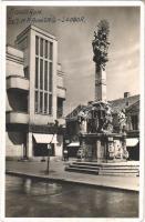 1941 Komárom, Komárno; Szentháromság szobor, Kovách üzlete. Lóránd Istvánné kiadása / Holy Trinity statue, shops (EK)