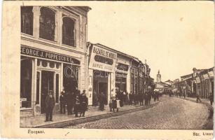 Foksány, Focsani; Str. Unirii, Bazarul / street view, shop of J. Poppescu & Co. (cut)