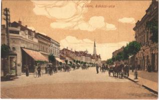 Losonc, Lucenec; Rákóczi utca, üzletek, kerékpár. Bicskei Zoltán kiadása / street view, shops, bicycle (EK)