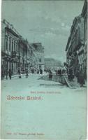 1899 (Vorläufer) Baja, Báró Eötvös József utca este, Dávid Jakab férfi szabó, könyvnyomda üzlete. Ifj. Wagner Antal