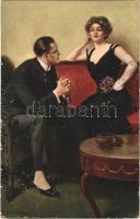 Romantic couple, lady art postcard s: Clarence F. Underwood