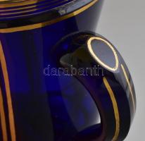 Füles és talpas kék színű pohár kézzel festett arany színű dekorral. Kopásokkal, alján karcolásokkal...