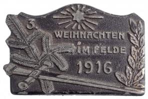 Osztrák-Magyar Monarchia 1916. 3. Karácsony a harcmezőn Zn sapkajelvény hátoldalon K.U.K. KRIEGSFÜRSORGEAMT felirattal és WINTER & ADLER A G WIEN gyártói jelzéssel (25x39mm) T:2 / Austro-Hungarian Monarchy 1916. 3. Weihnachten im Felde (3rd Christmas on the Battlefield) Zn cap badge with K.U.K. KRIEGSFÜRSORGEAMT inscription and makers mark WINTER & ADLER A G WIEN on the reverse (25x39mm) C:XF