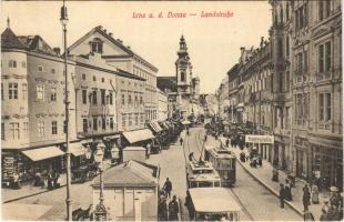 Linz, Landstraße, Haltestelle / street view, tram, tram stop, shops (EK)