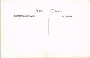 Unknown location, automobiles, gathering. photo (EB)