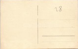 Budapest (?), Tóth Péter és Társai faszöges és tex cipőgyár üzlete cipészekkel és inasokkal. photo