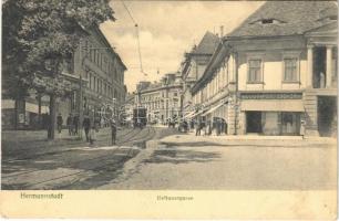 1910 Nagyszeben, Hermannstadt, Sibiu; Disznódi utca, villamos, Római császár szálloda, Julius Wermescher üzlete / Heltauergasse / street, tram, shops, hotel
