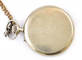 Alex Hüning Gen?ve zsebóra fém tokkal, számlapon kis elszineződés, működő, jó állapotban. Hozzá fém ...