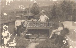 1912 Ruttka, Vrútky; gyerekek játékházzal / children with toy house. photo (felszíni sérülés / surface damage)