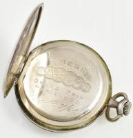 Ezüst (Ag) omega zsebóra. Jelzett, monogramos tok, jelzett szerkezet. Elindul, de tisztításra szorul...