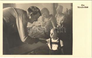 Ein Kinderblick. Adolf Hitler with child. NSDAP German Nazi Party propaganda. Photo Hoffmann 582.