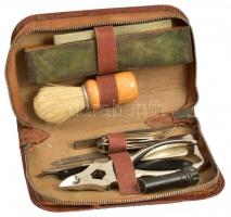 Régi bőr férfi neszeszer, solingeni borotvával, körömápolási eszközökkel, bőr borotvafenővel, fenőkővel, stb., 19x11x4 cm
