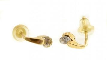 Arany (Au) 14K fülbevalópár, apró kővel, jelzett, szilikon sróffal, bruttó: 0,84 g