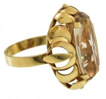 14K arany (Au) gyűrű, nagyméretű, ovális csiszolt kővel, jelzett, jó állapotban, bruttó: 6,4 g