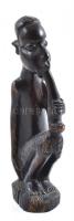 Pipázó afrikai figura. Faragott keményfa. 16 cm