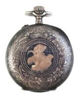 Ezüst (Ag). Dupla fedeles női zsebóra ezüst tokban, egész felületén figurális, niellós és aranyozott...