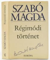 Szabó Magda: Régimódi történet. DEDIKÁLT! Bp., 2003, Európa. Kiadói kartonált kötés, papír védőborítóval, jó állapotban.